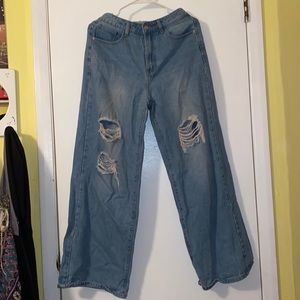 Wide legged baggy ripped jeans